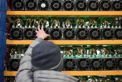 A sprawling solar-powered cryptocurrency mining farm under clear skies